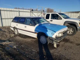 1994 Subaru Legacy L with VIN 4S3BJ6335R9948773, listed as a Copart auction lot 77018384 with 189,202 mi miles and Clean title. Bid and sale history available at DreamBid. Image 4.