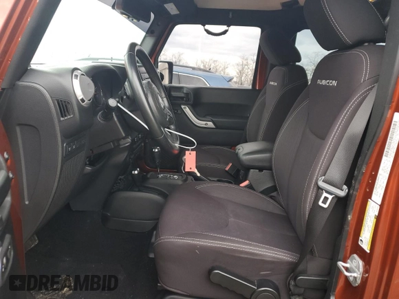 2014 Jeep Wrangler Unlimited Rubicon with VIN 1C4BJWFG0EL187243, listed as a Copart auction lot 45865005 with 53,064 mi miles and Salvage title. Bid and sale history available at DreamBid. Image 7.