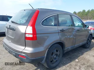 2009 Honda CR-V LX with VIN 5J6RE48369L021407, listed as a IAAI auction lot 41995070 with 224,823 mi miles. Bid and sale history available at carsss.com. Image 4.