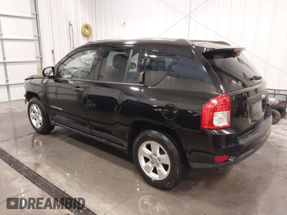 2014 Jeep Compass Sport with VIN 1C4NJCBA3ED777881, listed as a IAAI auction lot 41845518 with 113,566 mi miles. Bid and sale history available at carsss.com. Image 3.
