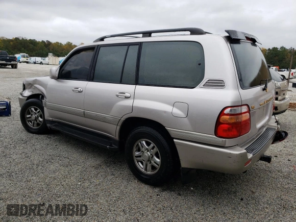 1999 Toyota Land Cruiser with VIN JT3HT05J4X0031312, listed as a Copart auction lot 78516674 with 308,642 mi miles and Salvage Title. Bid and sale history available at carsss.com. Image 2.