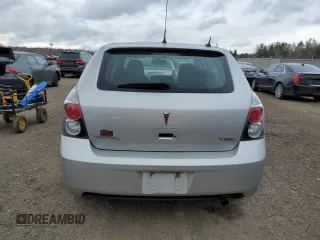 2009 Pontiac Vibe w/1SA with VIN 5Y2SP678X9Z431392, listed as a Copart auction lot 82357514 with 128,854 mi miles and Clean Title. Bid and sale history available at carsss.com. Image 6.