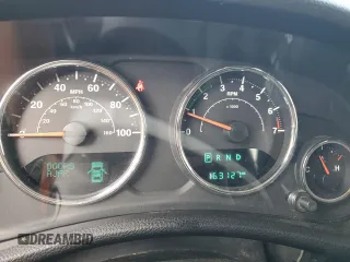 2014 Jeep Wrangler Unlimited Sport with VIN 1C4BJWDG6EL320381, listed as a Copart auction lot 51051704 with 163,127 mi miles and Salvage Title. Bid and sale history available at carsss.com. Image 9.
