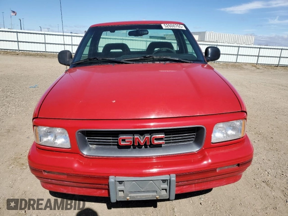 1995 GMC Sonoma z VIN 1GTCS144XS8524819, wystawiony jako Copart lot #52608765 z przebiegiem 84 794 mil mil oraz Szkody całkowita. Historia ofert i sprzedaży dostępna na DreamBid. Obrazek 5.