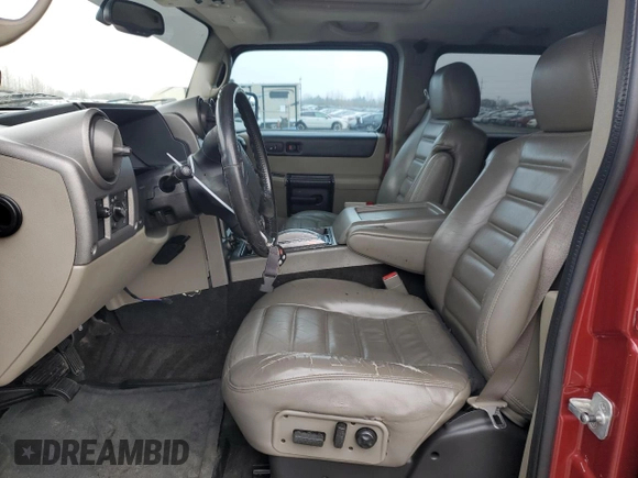 2003 Hummer H2 z VIN 5GRGN23U43H137876, wystawiony jako Copart lot #48081145 z przebiegiem 128 703 mil mil oraz Tytuł czysty. Historia ofert i sprzedaży dostępna na DreamBid. Obrazek 7.