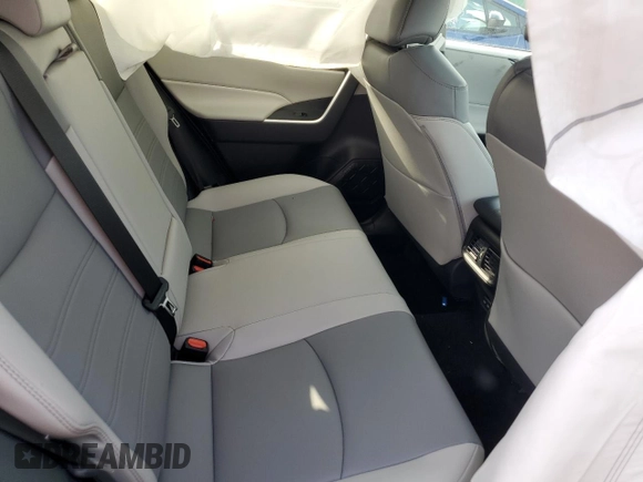 2024 Toyota RAV4 Hybrid XLE Premium with VIN 4T3B6RFV1RU174487, listed as a Copart auction lot 57208645 with 9,911 mi miles and Salvage title. Bid and sale history available at DreamBid. Image 10.