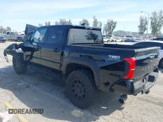 2025 Toyota Tacoma SR with VIN 3TMLB5JN2SM090007, listed as a IAAI auction lot 41830185 with 4,359 mi miles and . Bid and sale history available at DreamBid. Image 3.