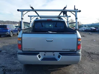 2006 Honda Ridgeline RTL with VIN 2HJYK165X6H570027, listed as a IAAI auction lot 41868389 with 207,020 mi miles. Bid and sale history available at carsss.com. Image 16.
