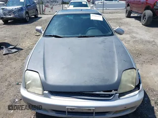 2001 Honda Prelude with VIN JHMBB62421C003129, listed as a IAAI auction lot 41989431 with 225,130 mi miles and . Bid and sale history available at DreamBid. Image 12.