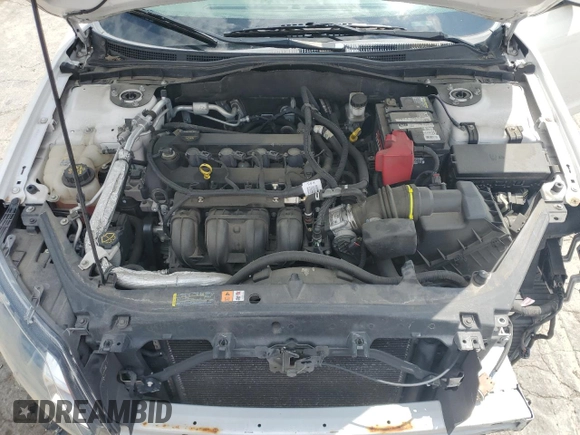 2012 Ford Fusion SEL z VIN 3FAHP0JAXCR241497, wystawiony jako Copart lot #58884165 z przebiegiem 100 813 mil mil oraz Szkoda całkowita • Salvage title. Historia ofert i sprzedaży dostępna na DreamBid. Obrazek 11.