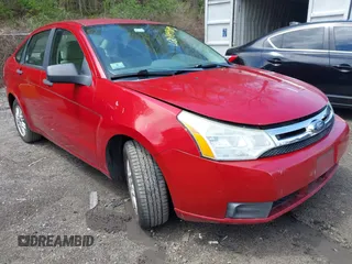 2009 Ford Focus SE with VIN 1FAHP35N89W243205, listed as a IAAI auction lot 42149989 with 148,058 mi miles. Bid and sale history available at carsss.com. Image 1.