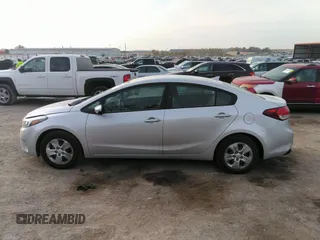 2018 Kia Forte LX with VIN 3KPFK4A79JE210080, listed as a IAAI auction lot 40681931 with 124,986 mi miles and . Bid and sale history available at DreamBid. Image 14.