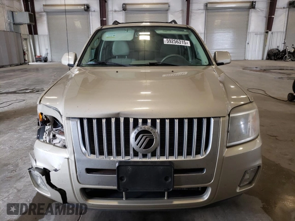 2011 Mercury Mariner Premier z VIN 4M2CN9HG9BKJ06775, wystawiony jako Copart lot #59256315 z przebiegiem 186 694 mil mil oraz Szkoda całkowita • Salvage title. Historia ofert i sprzedaży dostępna na DreamBid. Obrazek 5.