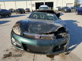 2007 Saturn Sky z VIN 1G8MB33B67Y100006, wystawiony jako Copart lot #46546375 z przebiegiem Nie podano mil oraz Szkody całkowita. Historia ofert i sprzedaży dostępna na DreamBid. Obrazek 5.