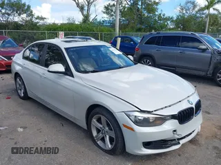 2013 BMW 3 Series 328i with VIN WBA3A5C52DF356285, listed as a IAAI auction lot 40693418 with 112,832 mi miles and . Bid and sale history available at DreamBid. Image 1.