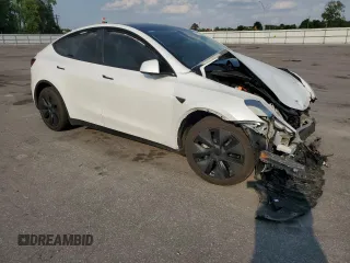 2024 Tesla Model Y Long Range with VIN 7SAYGAEEXRF109995, listed as a Copart auction lot 55160345 with Not provided miles and Salvage title. Bid and sale history available at DreamBid. Image 4.