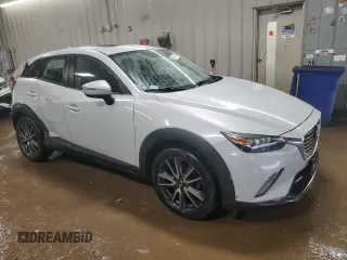2017 Mazda CX-3 Touring with VIN JM1DKFC76H0161813, listed as a Copart auction lot 50931135 with 133,561 mi miles and Salvage Title. Bid and sale history available at carsss.com. Image 4.