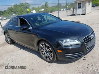 2015 Audi A7 Premium Plus with VIN WAUWGAFC6FN010747, listed as a IAAI auction lot 42612053 with 103,854 mi miles and . Bid and sale history available at DreamBid. Image 1.