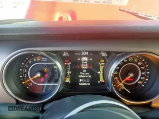 2020 Jeep Wrangler Unlimited Black and Tan with VIN 1C4HJXDG1LW189503, listed as a Copart auction lot 52196645 with 135,305 mi miles and Salvage title. Bid and sale history available at DreamBid. Image 9.