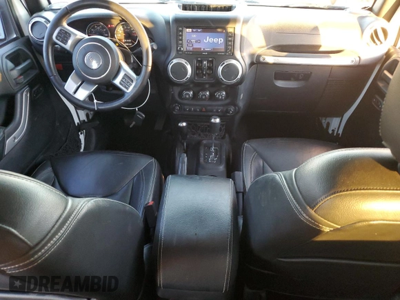 2015 Jeep Wrangler Unlimited Rubicon with VIN 1C4BJWFG5FL659017, listed as a Copart auction lot 84435034 with 69,915 mi miles and Salvage Title. Bid and sale history available at carsss.com. Image 8.