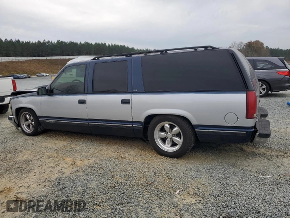 1994 GMC Suburban z VIN 1GKEC16K4RJ762562, wystawiony jako Copart lot #81242184 z przebiegiem 182 583 mil mil oraz Szkoda całkowita • Salvage title. Historia ofert i sprzedaży dostępna na DreamBid. Obrazek 2.