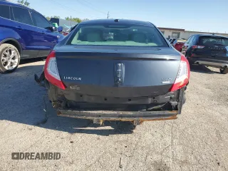 2014 Lincoln MKS EcoBoost z VIN 1LNHL9FT8EG607807, wystawiony jako Copart lot #57755915 z przebiegiem 203 316 mil mil oraz Szkoda całkowita • Salvage title. Historia ofert i sprzedaży dostępna na DreamBid. Obrazek 6.