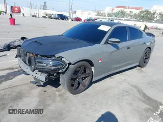 2019 Dodge Charger Scat Pack with VIN 2C3CDXGJ4KH576394, listed as a IAAI auction lot 41846702 with 70,209 mi miles and . Bid and sale history available at DreamBid. Image 17.