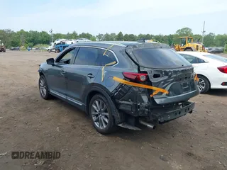 2020 Mazda CX-9 Grand Touring with VIN JM3TCBDY4L0408920, listed as a IAAI auction lot 42325272 with 45,837 mi miles and . Bid and sale history available at DreamBid. Image 3.