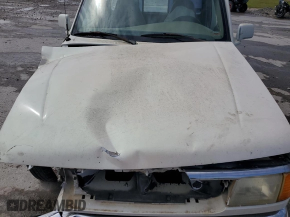 1997 Ford Ranger XLT with VIN 1FTCR10A8VPB29636, listed as a Copart auction lot 57250435 with 215,537 mi miles and Salvage title. Bid and sale history available at DreamBid. Image 11.