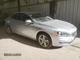 2014 Volvo S60 T5 with VIN YV1612FS7E2293736, listed as a Copart auction lot 42958965 with 127,657 mi miles and Salvage Title. Bid and sale history available at carsss.com. Image 4.
