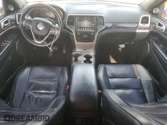 2015 Jeep Grand Cherokee Overland with VIN 1C4RJFCMXFC237723, listed as a Copart auction lot 50318145 with 103,741 mi miles and Salvage title. Bid and sale history available at DreamBid. Image 8.
