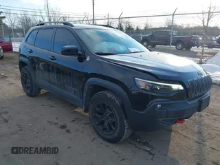 2022 Jeep Cherokee Trailhawk with VIN 1C4PJMBX7ND508267, listed as a IAAI auction lot 41356773 with 74,019 mi miles. Bid and sale history available at carsss.com. Image 1.