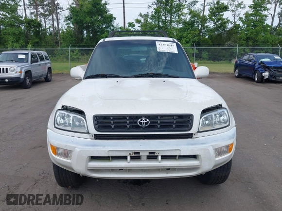 1999 Toyota RAV4 with VIN JT3GP10V8X7054552, listed as a IAAI auction lot 42361645 with 266,630 mi miles and . Bid and sale history available at DreamBid. Image 6.