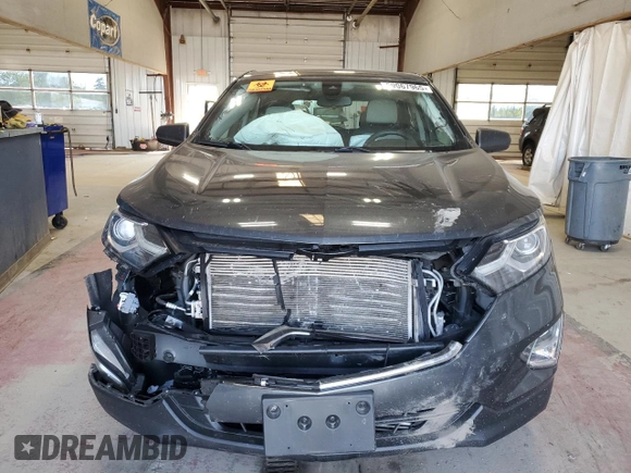 2021 Chevrolet Equinox LS z VIN 2GNAXSEV9M6103938, wystawiony jako Copart lot #59067965 z przebiegiem Nie podano mil oraz Szkoda całkowita • Salvage title. Historia ofert i sprzedaży dostępna na DreamBid. Obrazek 5.