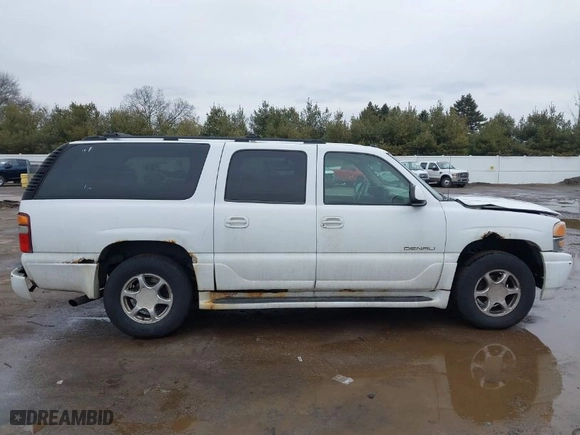 2003 GMC Yukon XL Denali with VIN 1GKFK66U93J235985, listed as a IAAI auction lot 41660832 with NaN miles. Bid and sale history available at carsss.com. Image 14.