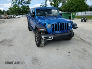 2023 Jeep Gladiator Sport S z VIN 1C6HJTAG4PL562366, wystawiony jako Copart lot #51542765 z przebiegiem 21 564 mil mil oraz Szkoda całkowita • Salvage title. Historia ofert i sprzedaży dostępna na DreamBid. Obrazek 14.