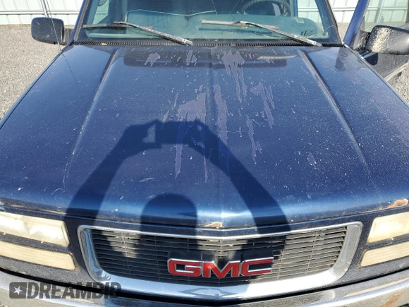 1995 GMC Sierra 1500 z VIN 2GTEK19K3S1591653, wystawiony jako Copart lot #75799124 z przebiegiem 329 311 mil mil oraz Nie do naprawy. Historia ofert i sprzedaży dostępna na DreamBid. Obrazek 11.
