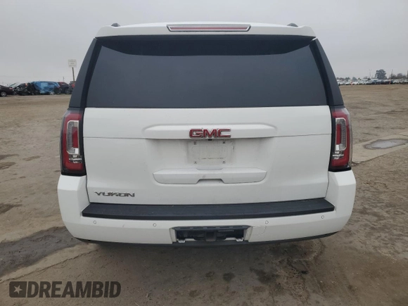 2015 GMC Yukon SLE with VIN 1GKS1AKC8FR733084, listed as a Copart auction lot 82960064 with 163,576 mi miles and Salvage Title. Bid and sale history available at carsss.com. Image 6.
