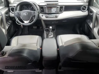 2016 Toyota RAV4 Limited with VIN 2T3DFREVXGW495077, listed as a Copart auction lot 55533505 with 122,483 mi miles and Salvage title. Bid and sale history available at DreamBid. Image 8.