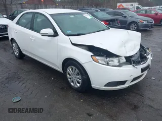 2012 Kia Forte EX with VIN KNAFU4A25C5470311, listed as a IAAI auction lot 41964569 with 146,551 mi miles. Bid and sale history available at carsss.com. Image 1.