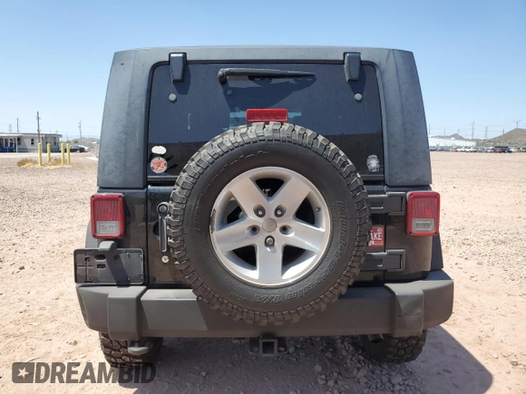2009 Jeep Wrangler Rubicon with VIN 1J4GA64179L703716, listed as a Copart auction lot 61084215 with 190,262 mi miles and Salvage title. Bid and sale history available at DreamBid. Image 6.