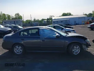 2006 Nissan Altima S with VIN 1N4AL11DX6C266058, listed as a IAAI auction lot 42388534 with 159,045 mi miles and . Bid and sale history available at DreamBid. Image 13.