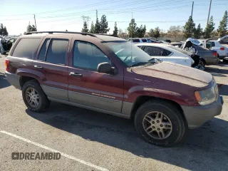 2002 Jeep Grand Cherokee Laredo with VIN 1J4GX48S52C265385, listed as a Copart auction lot 88823385 with 225,106 mi miles and Clean title. Bid and sale history available at DreamBid. Image 4.
