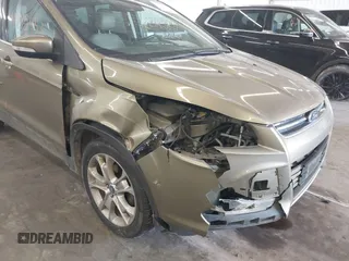2013 Ford Escape SEL with VIN 1FMCU0HX0DUB83459, listed as a IAAI auction lot 41985453 with 198,182 mi miles and . Bid and sale history available at DreamBid. Image 6.