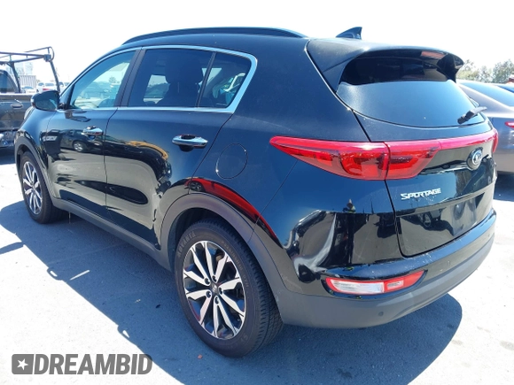 2019 Kia Sportage EX with VIN KNDPN3AC2K7602435, listed as a IAAI auction lot 42233427 with 58,730 mi miles and . Bid and sale history available at DreamBid. Image 3.