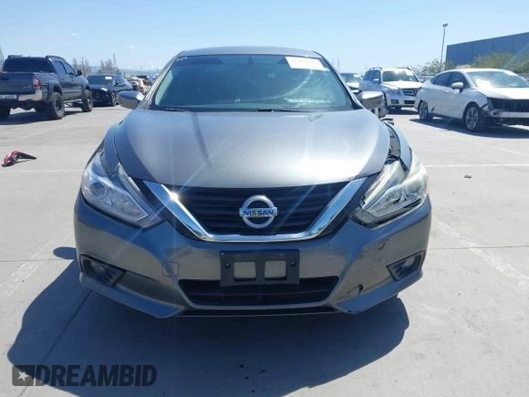 2017 Nissan Altima S z VIN 1N4AL3AP4HC271765, wystawiony jako IAAI lot #41968905 z przebiegiem 106 621 mil mil oraz . Historia ofert i sprzedaży dostępna na DreamBid. Obrazek 13.
