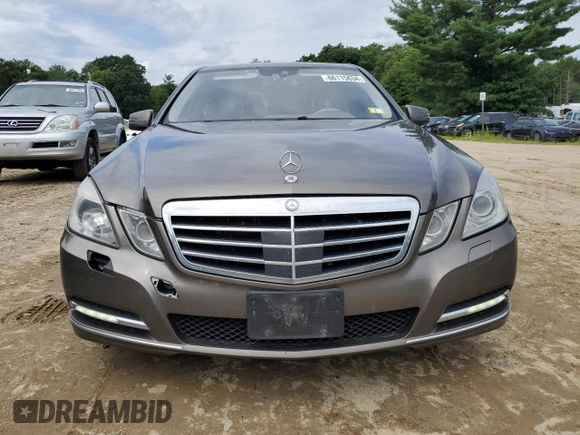 2011 Mercedes-Benz E-Class E 550 Luxury with VIN WDDHF9AB1BA385318, listed as a Copart auction lot 66115634 with 197,595 mi miles and Salvage Title. Bid and sale history available at carsss.com. Image 5.