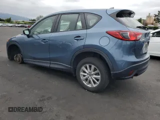 2016 Mazda CX-5 Sport with VIN JM3KE2BY4G0789618, listed as a Copart auction lot 53318245 with 52,801 mi miles and Salvage Title. Bid and sale history available at carsss.com. Image 2.
