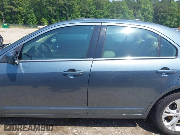 2012 Ford Fusion SE z VIN 3FAHP0HA4CR209490, wystawiony jako IAAI lot #42376506 z przebiegiem 145 622 mil mil oraz . Historia ofert i sprzedaży dostępna na DreamBid. Obrazek 14.