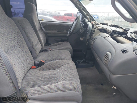 1999 Dodge Ram 1500 with VIN 3B7HF13Z8XG140644, listed as a IAAI auction lot 41971280 with 157,584 mi miles. Bid and sale history available at carsss.com. Image 5.